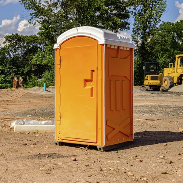 how often are the porta potties cleaned and serviced during a rental period in Dedham